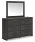 Delmorta Full Panel Bed with Storage, Dresser, Mirror, Chest and Nightstand