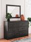 Delmorta Full Panel Bed with Storage, Dresser, Mirror and Nightstand